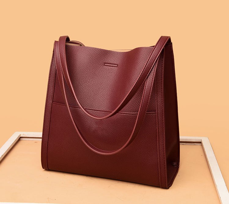 Corinne - Elegante en ruime leren schoudertas