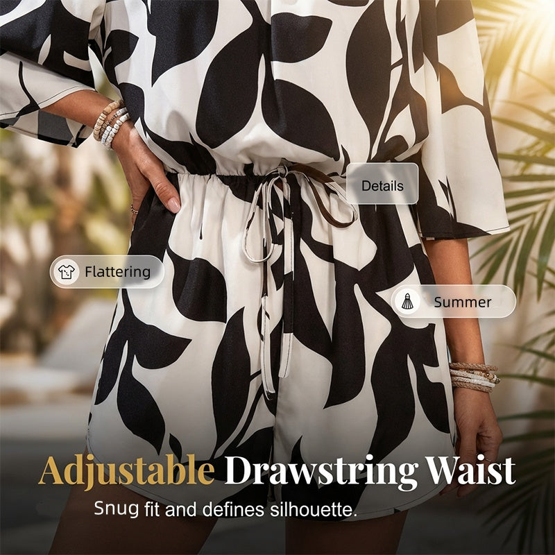 Ivoriah - Dames short jumpsuit met blote schouders en bladerenprint