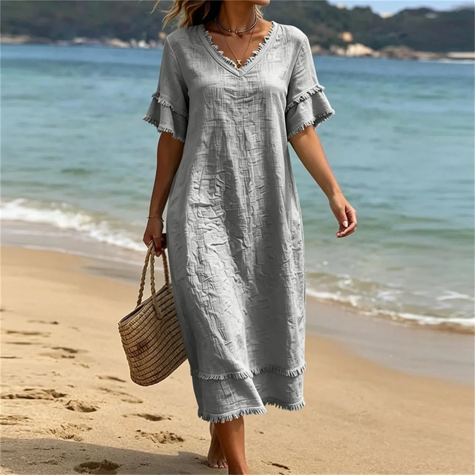Naelle - Vrouwenjurk met V-hals en franjes in boho-stijl