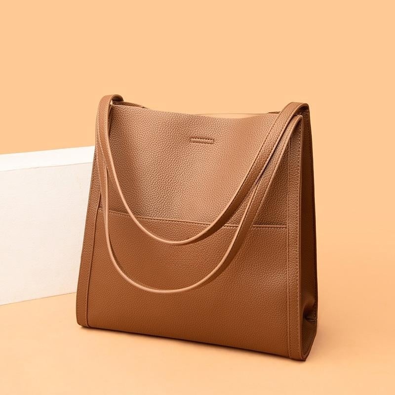 Corinne - Elegante en ruime leren schoudertas
