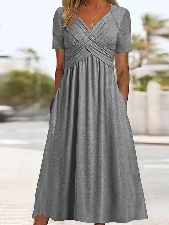 Malina - Elegante V-hals jurk met vloeiend silhouet