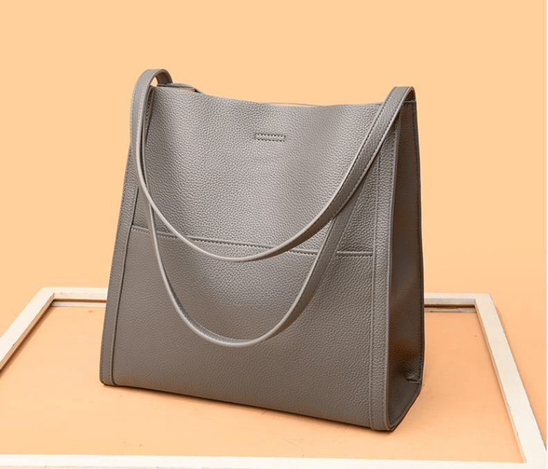 Corinne - Elegante en ruime leren schoudertas