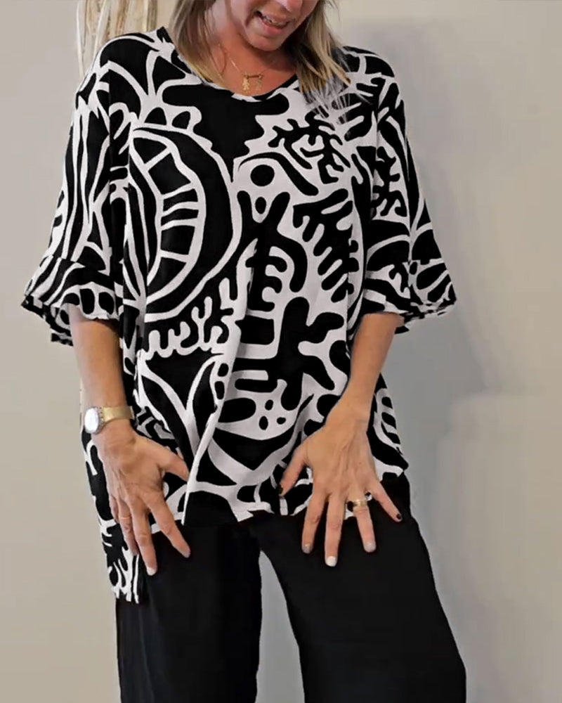 Elin - Ruime dames top met abstracte print en vloeiende mouwen