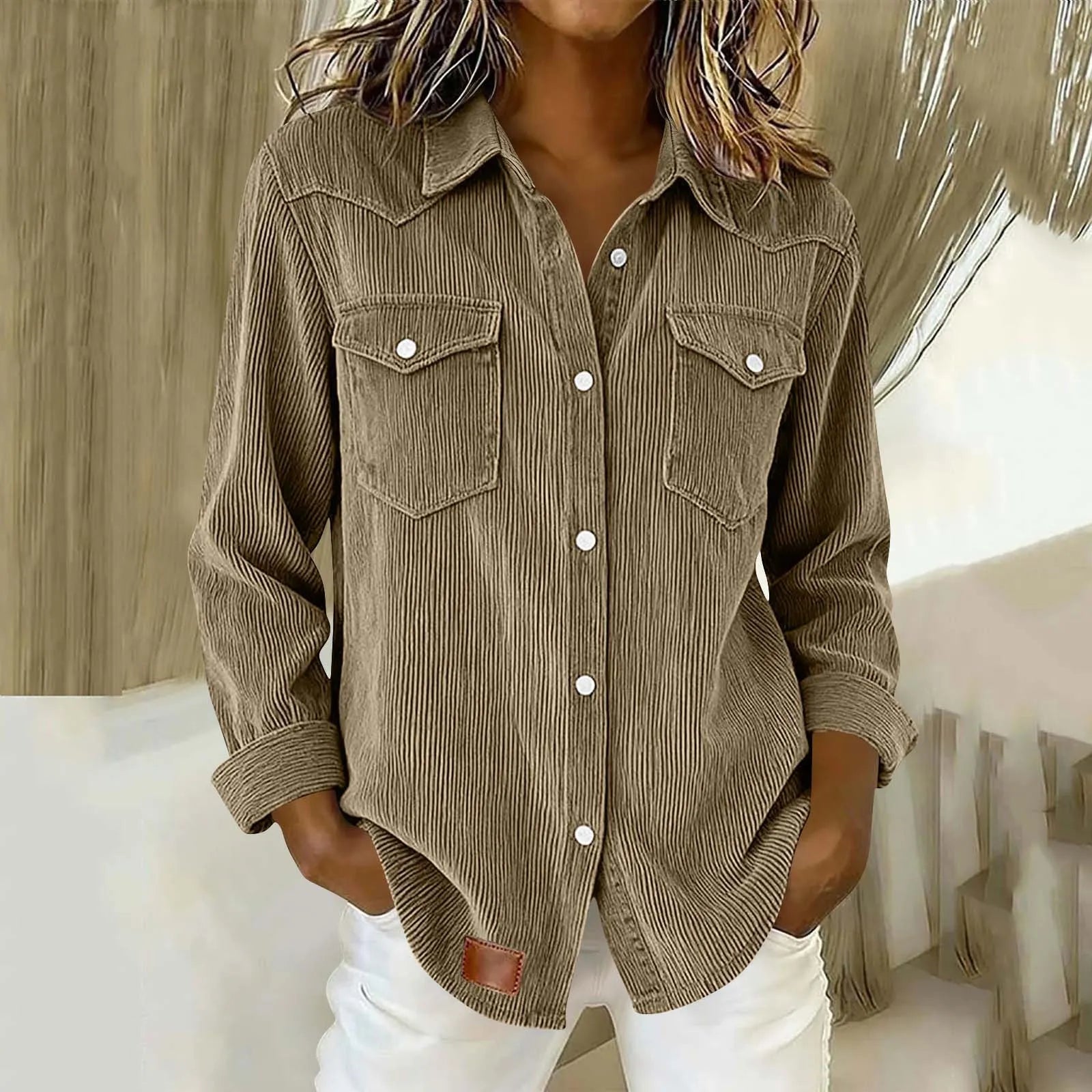 Sigrid - Gestreepte damesblouse met knopen en zakken