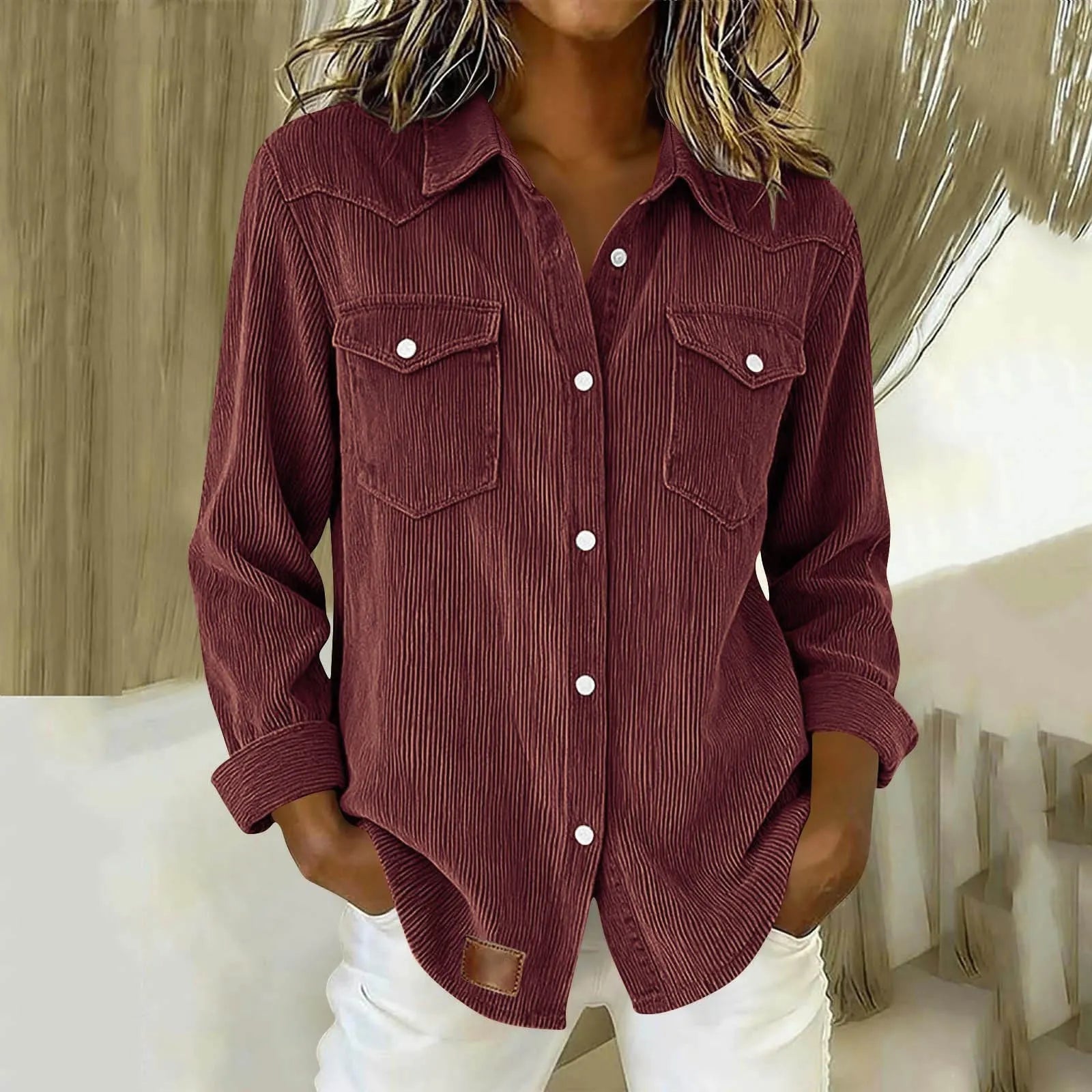 Sigrid - Gestreepte damesblouse met knopen en zakken