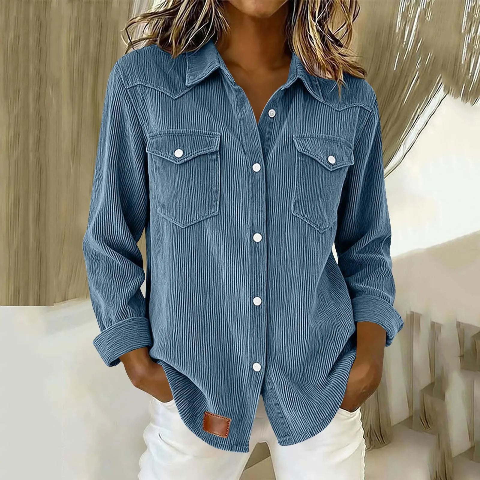 Sigrid - Gestreepte damesblouse met knopen en zakken