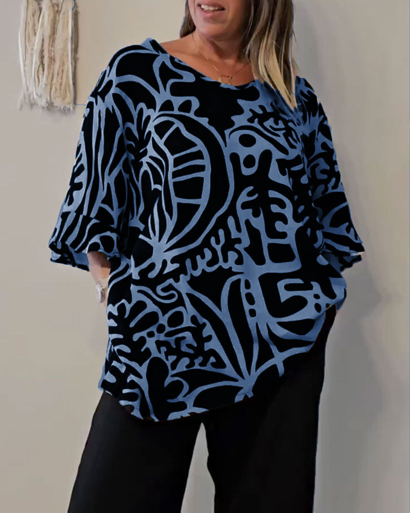 Elin - Ruime dames top met abstracte print en vloeiende mouwen