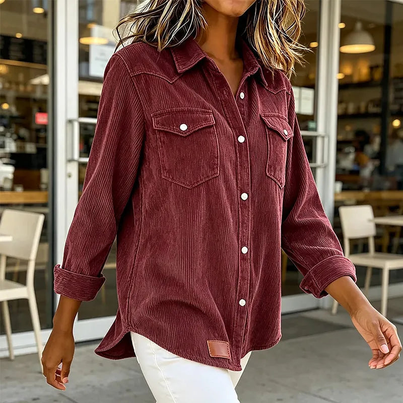Sigrid - Gestreepte damesblouse met knopen en zakken