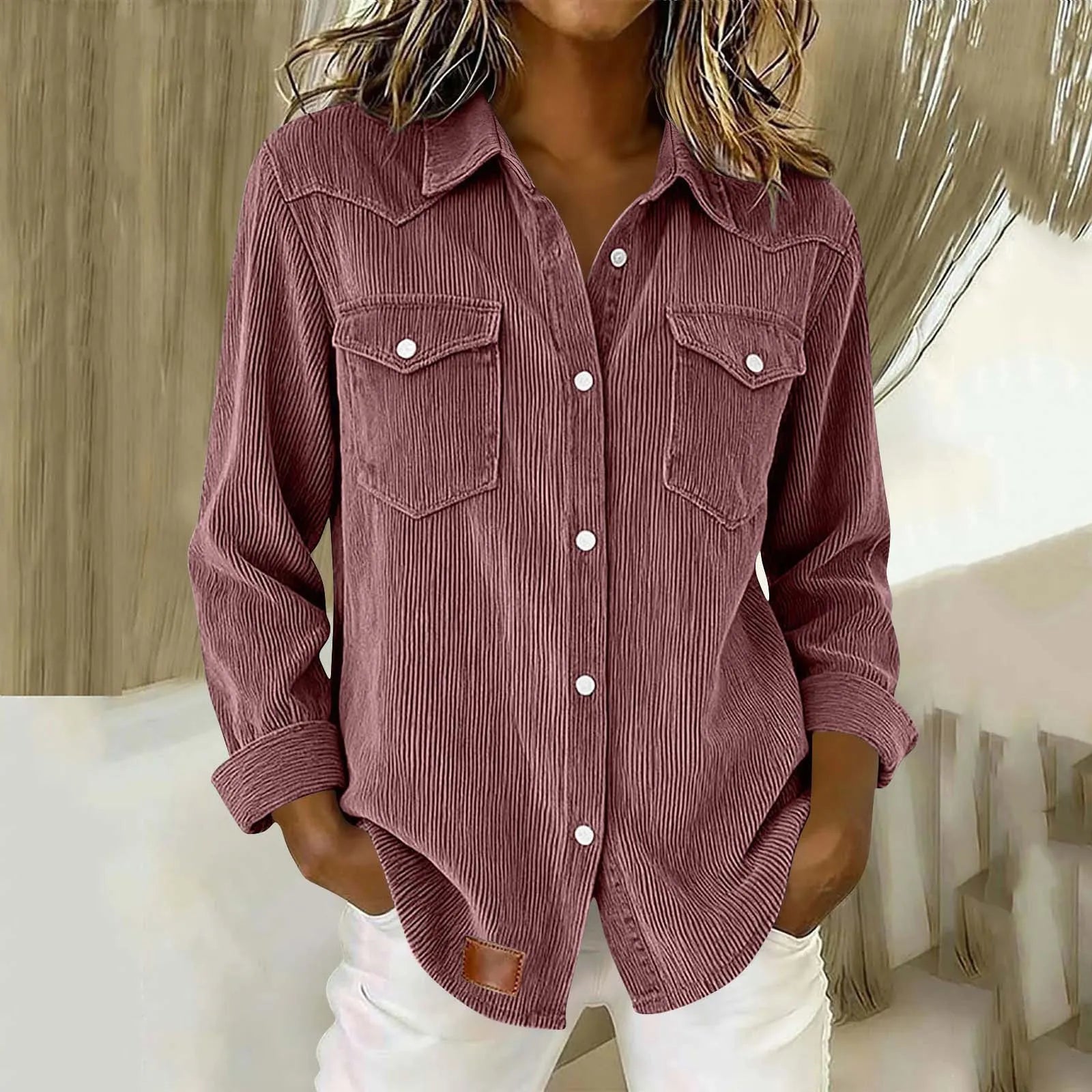 Sigrid - Gestreepte damesblouse met knopen en zakken