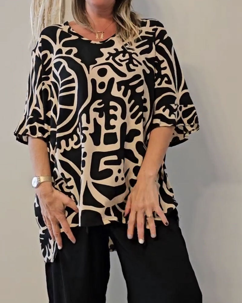 Elin - Ruime dames top met abstracte print en vloeiende mouwen