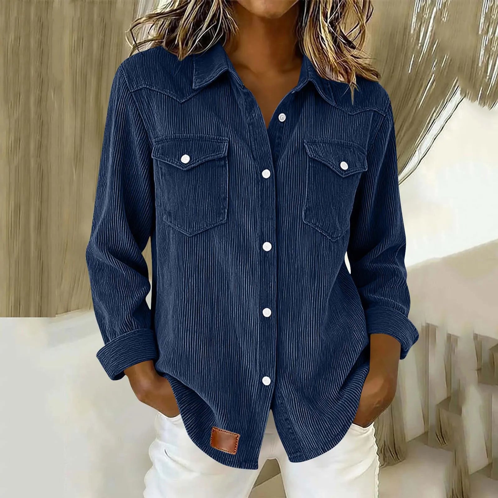 Sigrid - Gestreepte damesblouse met knopen en zakken