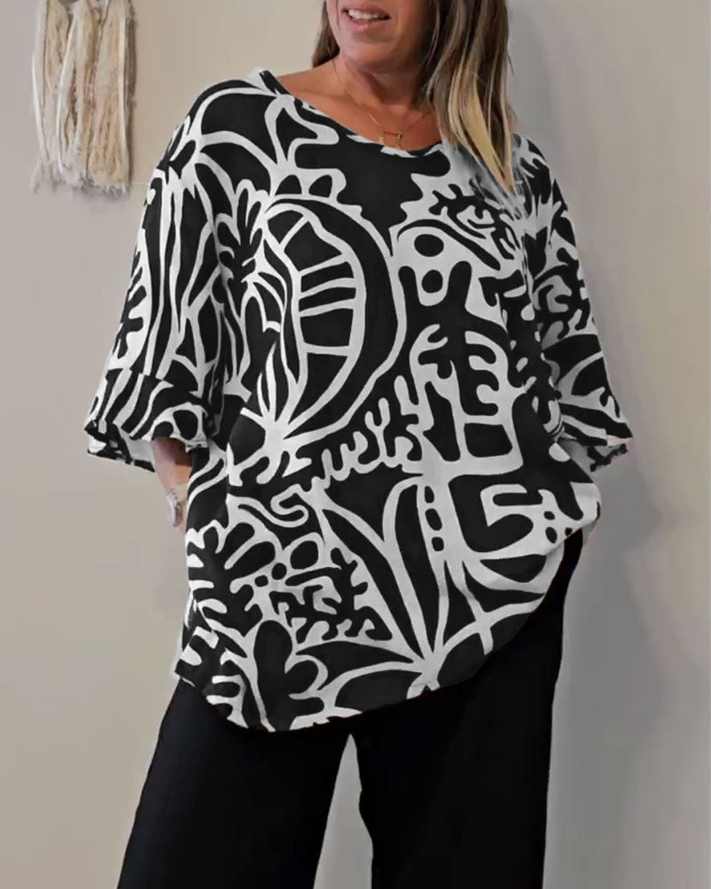 Elin - Ruime dames top met abstracte print en vloeiende mouwen