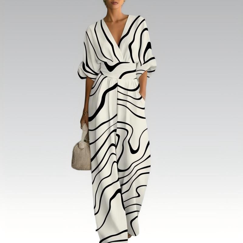 Nevina - Dames jumpsuit met V-hals en vloeiende pasvorm